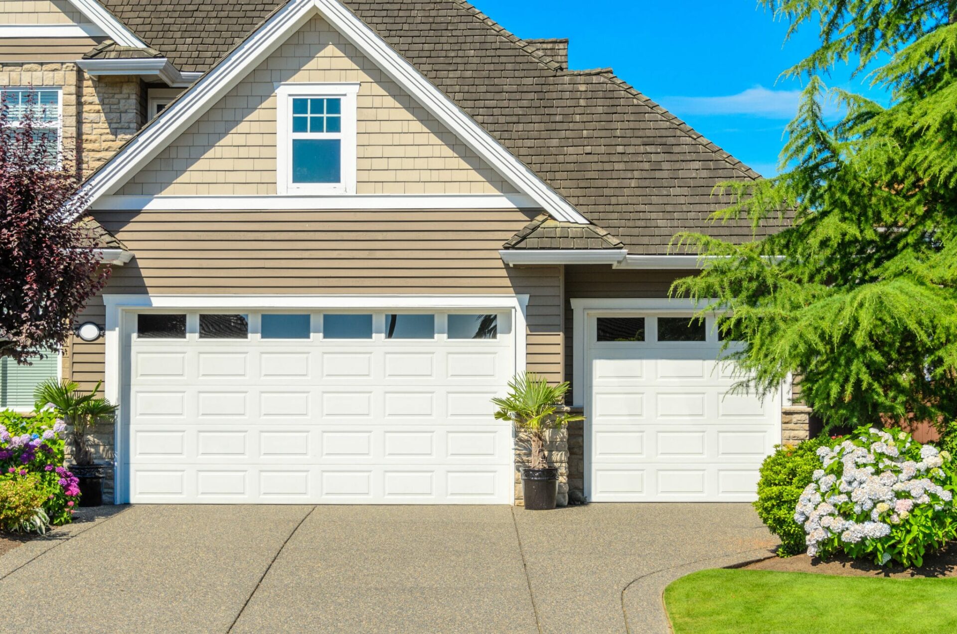 Luxury house showing a garage door.