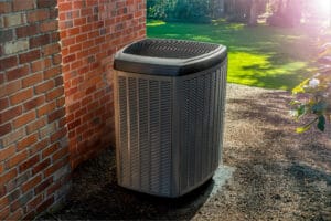 Energy efficient heat pump next to a house